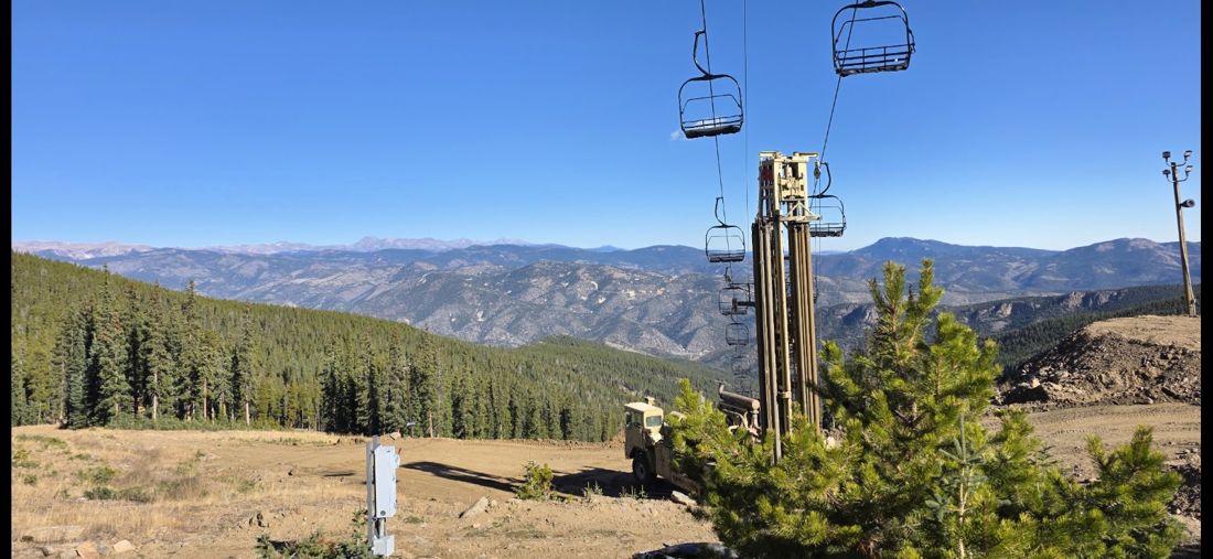 Drill rig at a ski area below a chairlift